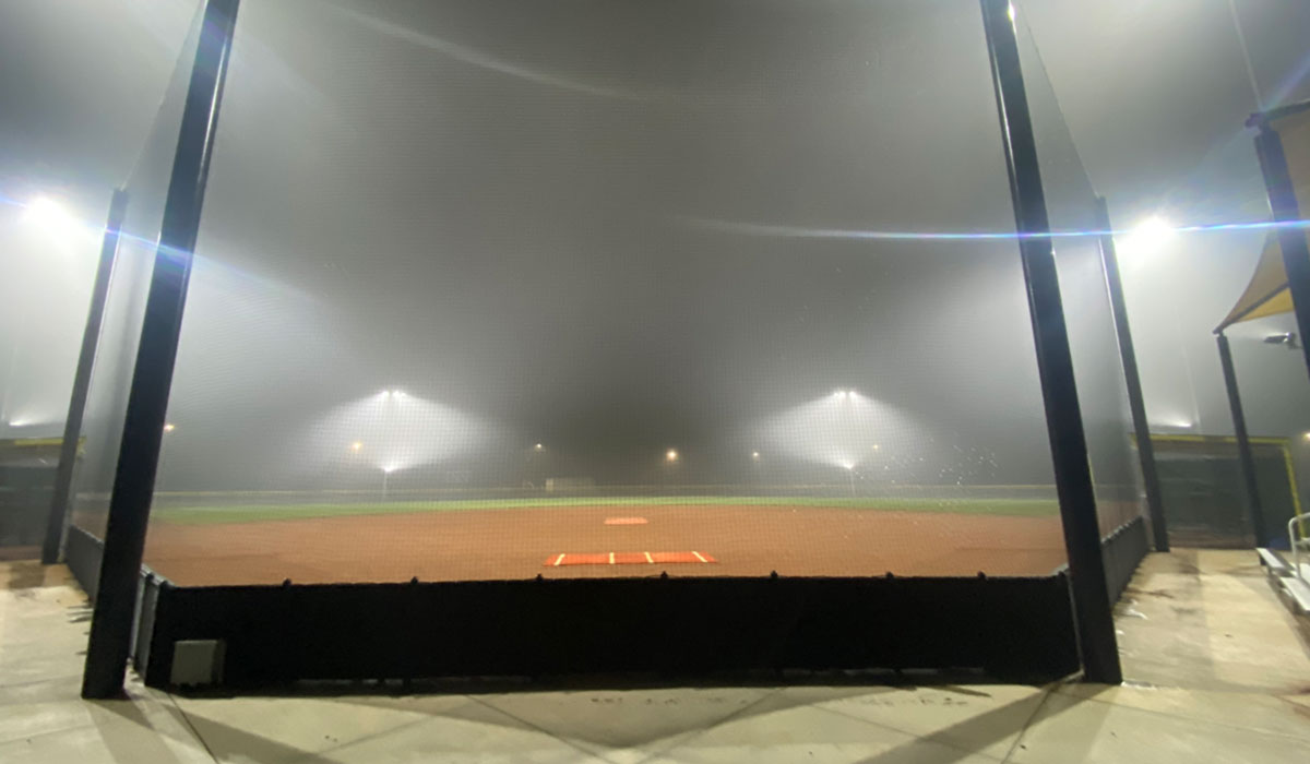 Baseball field with the stadium lights on